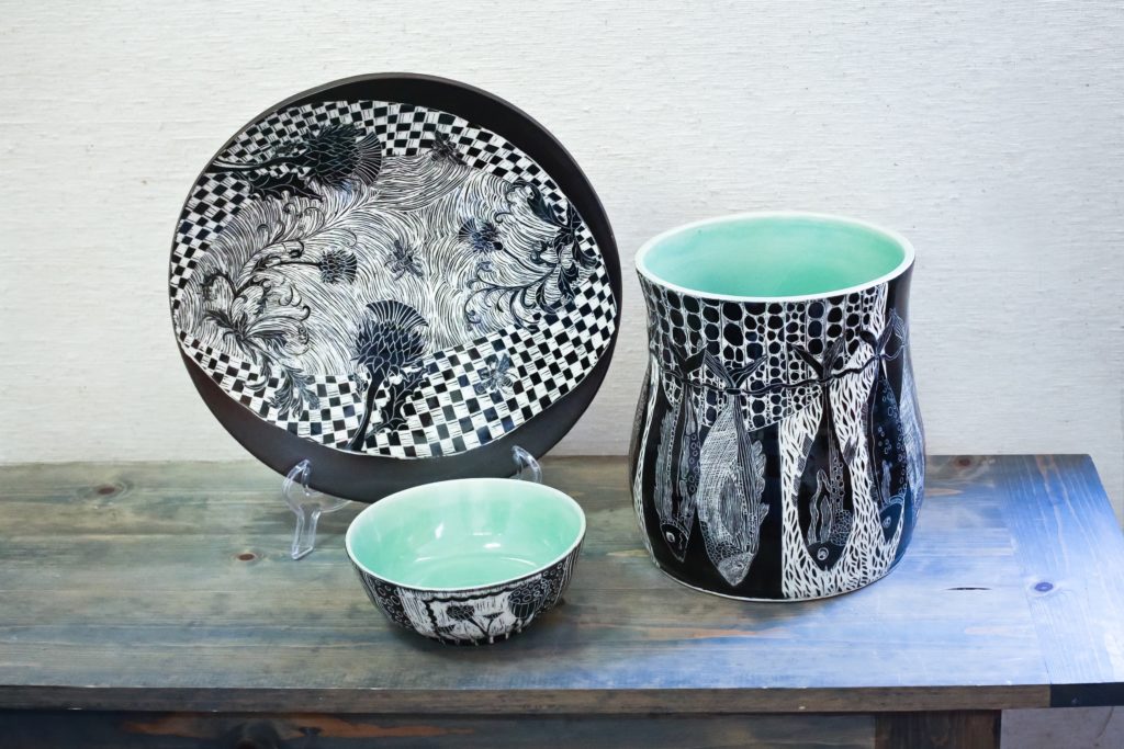 Three examples of sgraffito created by the master craftsperson Patricia Griffin